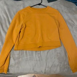 Adorable mustard crop top. Perfect for fall!